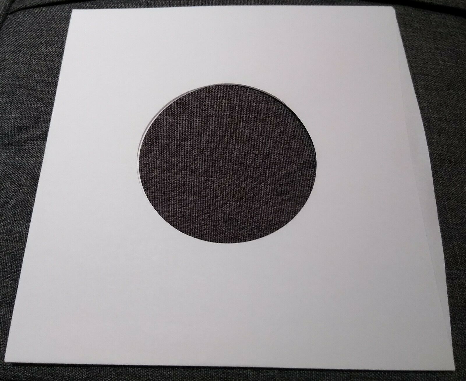 Package Of 100, 45 Rpm 7" Record Sleeves 20# White Paper.  100% Acid-free.